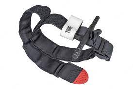 A combat tourniquet, a life-saving medical device used to control severe bleeding in emergency situations. The tourniquet is made of durable materials, featuring an adjustable strap and a windlass for effective application. It is an essential tool for first responders and military personnel.